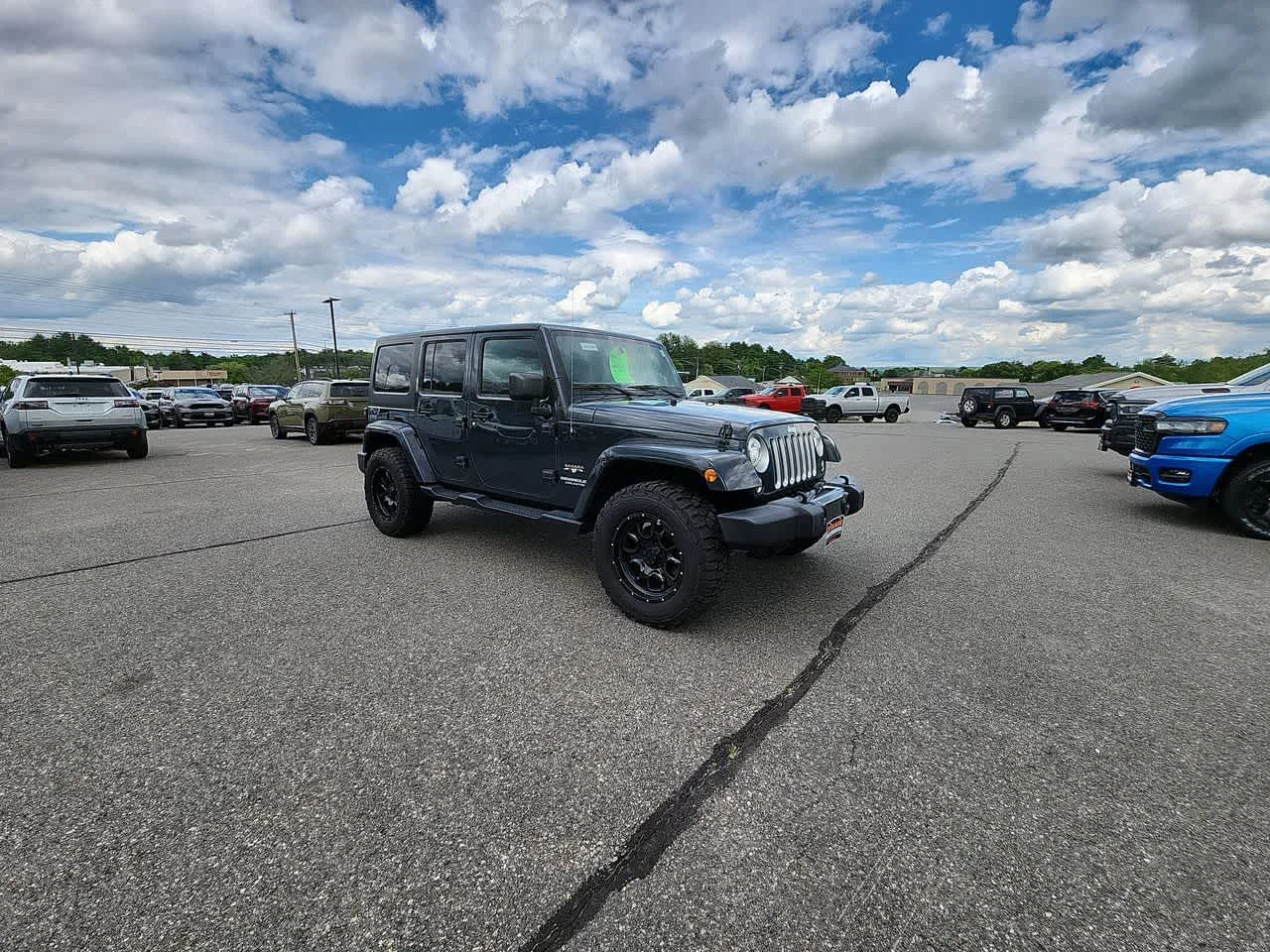 Used 2017 Jeep Wrangler Unlimited Sahara with VIN 1C4BJWEG7HL711896 for sale in Oakland, ME