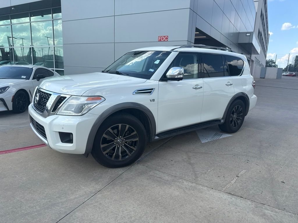Used 2017 Pearl White Nissan Platinum image 1