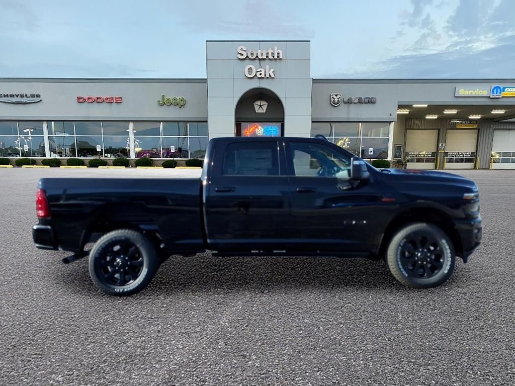 New 2026 Diamond Black Crystal Pearl-Coat Exterior Paint RAM Laramie image 2