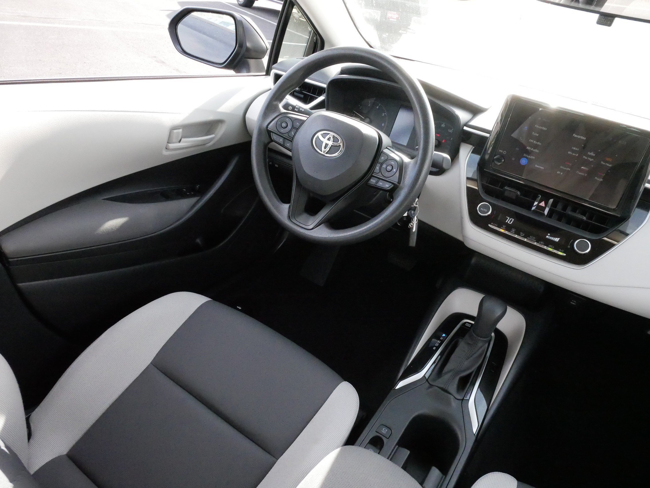 Used 2025 Midnight Black Metallic Toyota Hybrid LE image 9