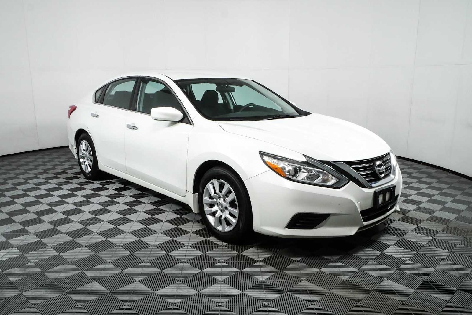 Used 2017 Pearl White Nissan 2.5 S image 1