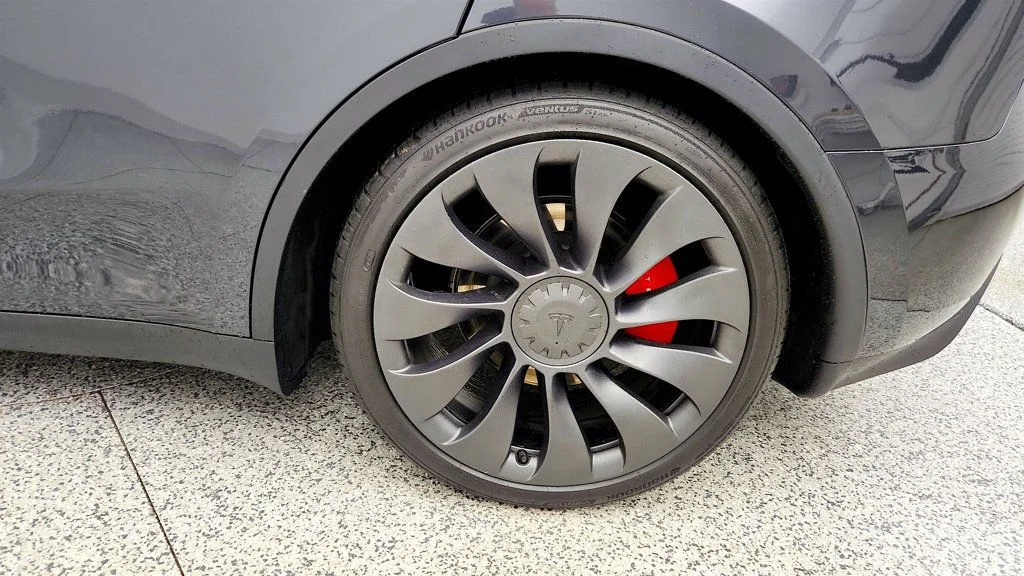 Used 2024 Stealth Grey Tesla Performance AWD w/ White & Black Interior image 9
