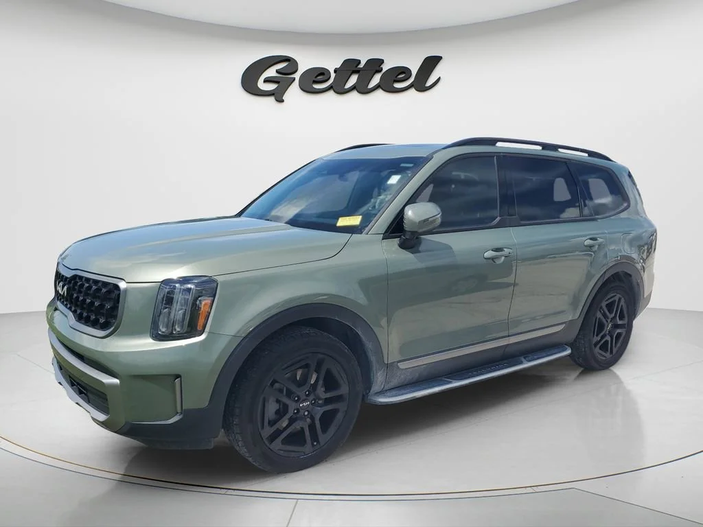 Used 2023 Green Kia EX X-Line image 1