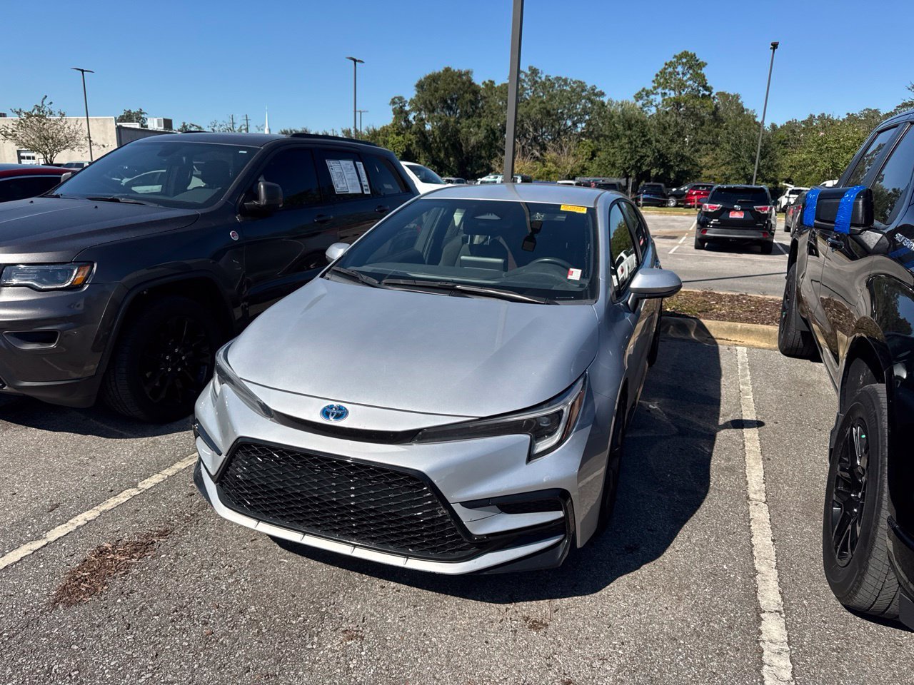 Used 2024 Silver Toyota SE image 1