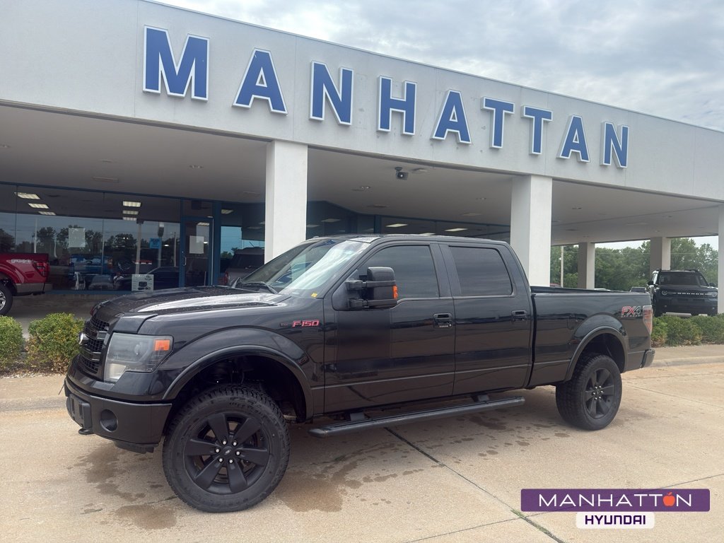 Used 2013 Tuxedo Black Metallic Ford FX4 image 1