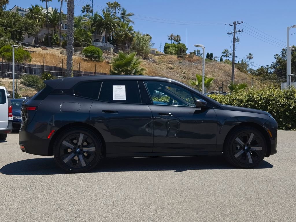 Used 2024 Dark Graphite Metallic BMW xDrive50 image 3