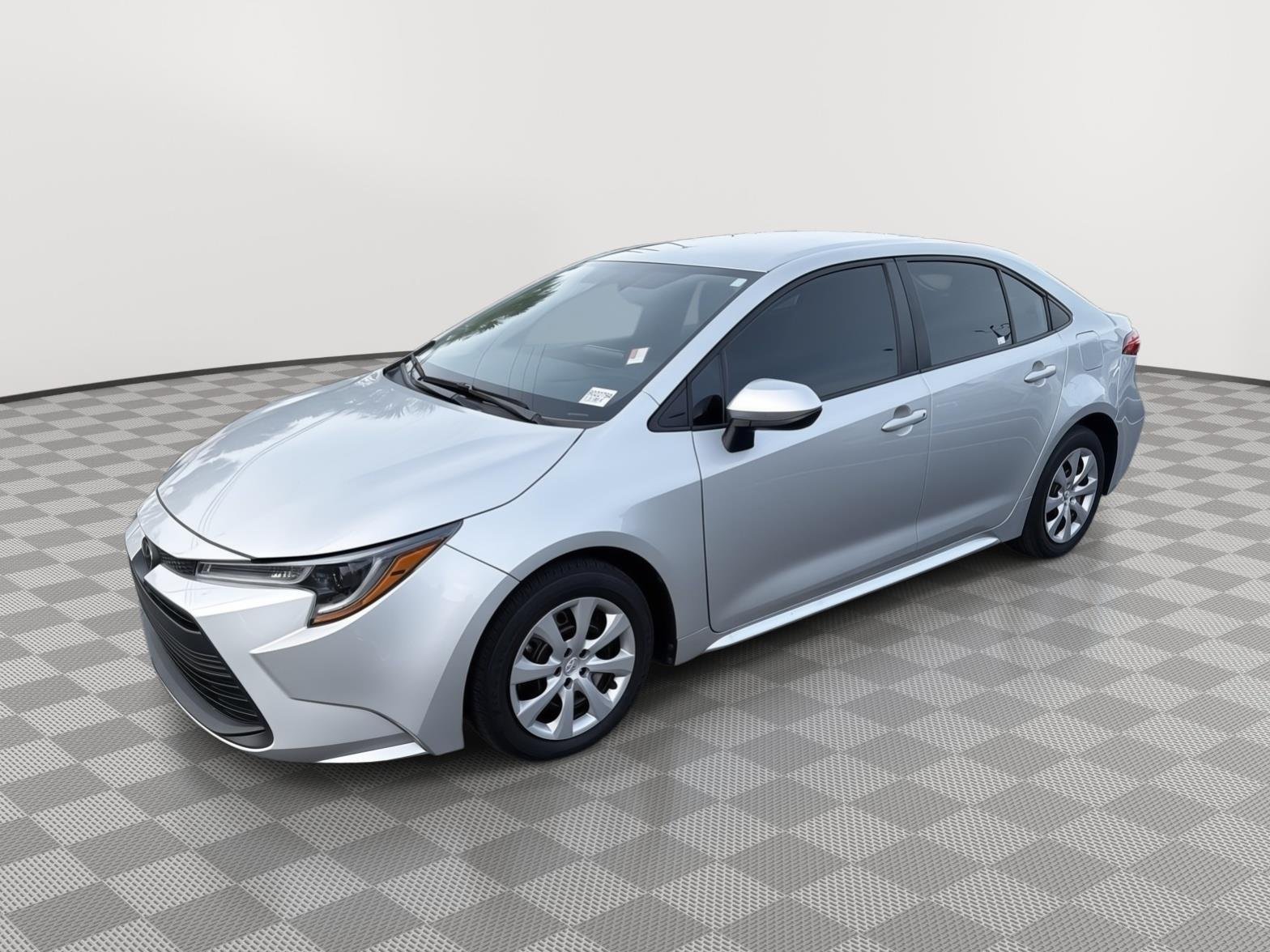 Used 2024 Classic Silver Metallic Toyota LE image 1