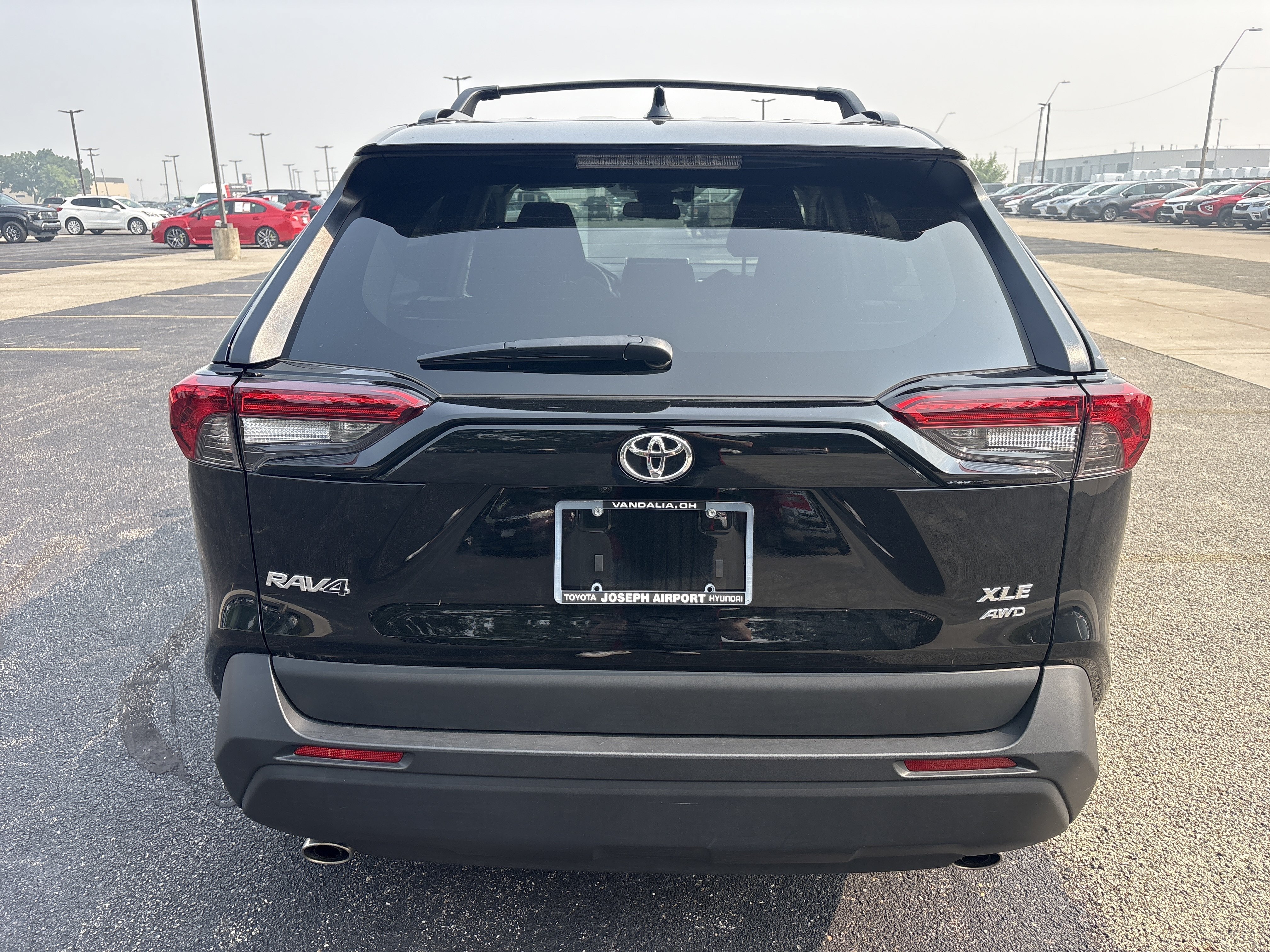 Used 2024 Midnight Black Metallic Toyota XLE image 2