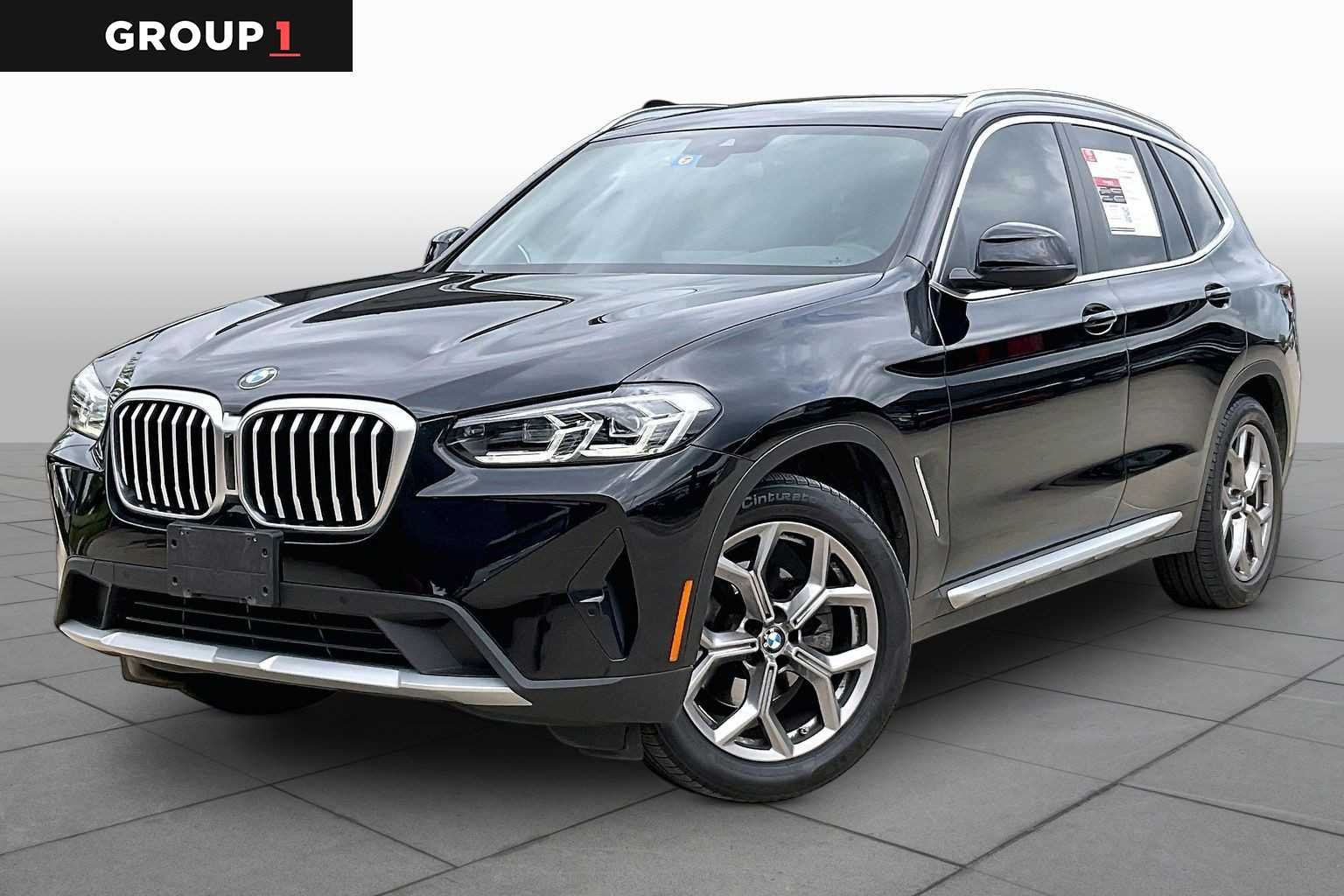 Used 2022 Black Sapphire Metallic BMW sDrive30i image 1