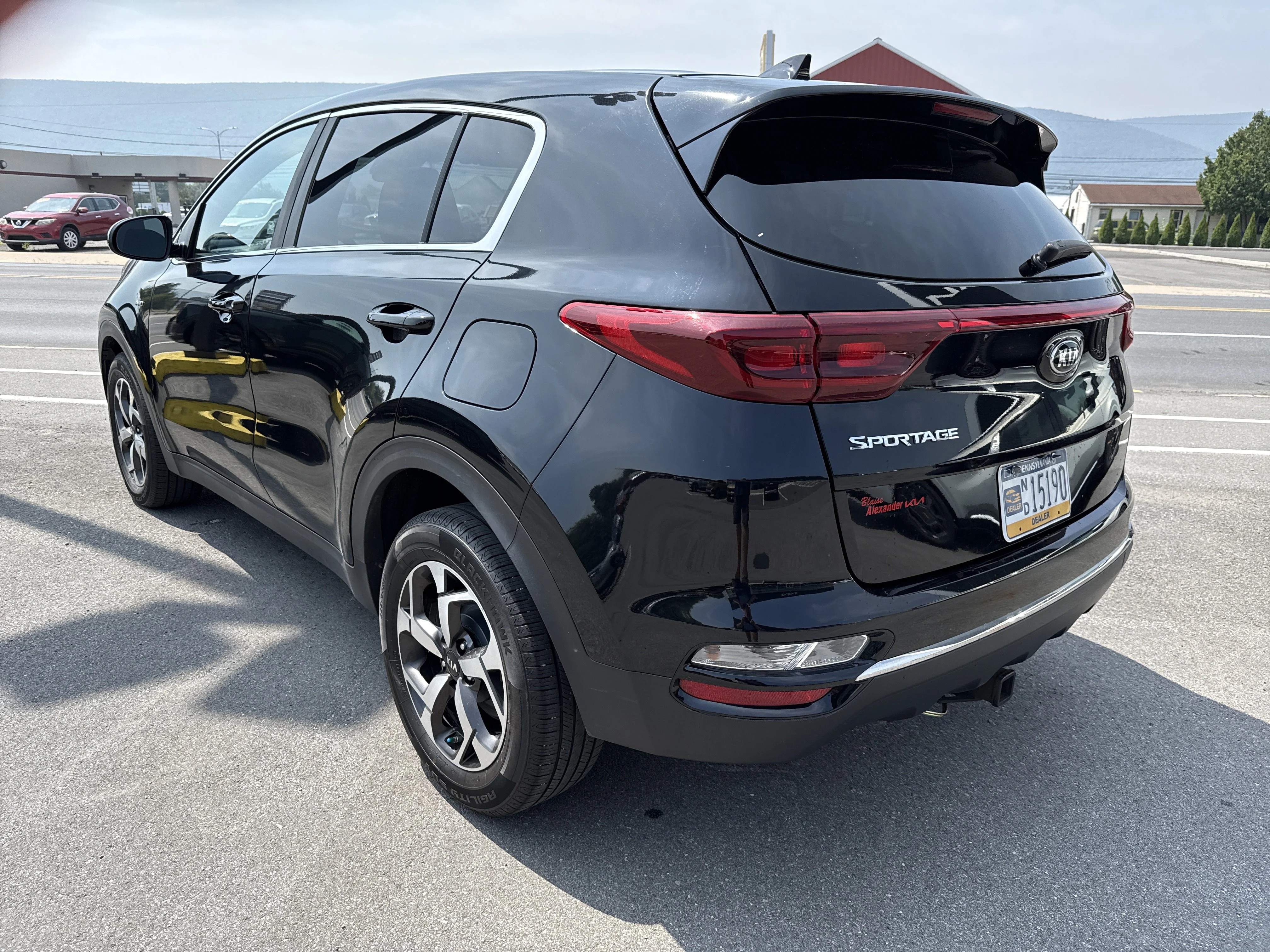 Used 2020 Black Cherry Pearl Kia LX image 6