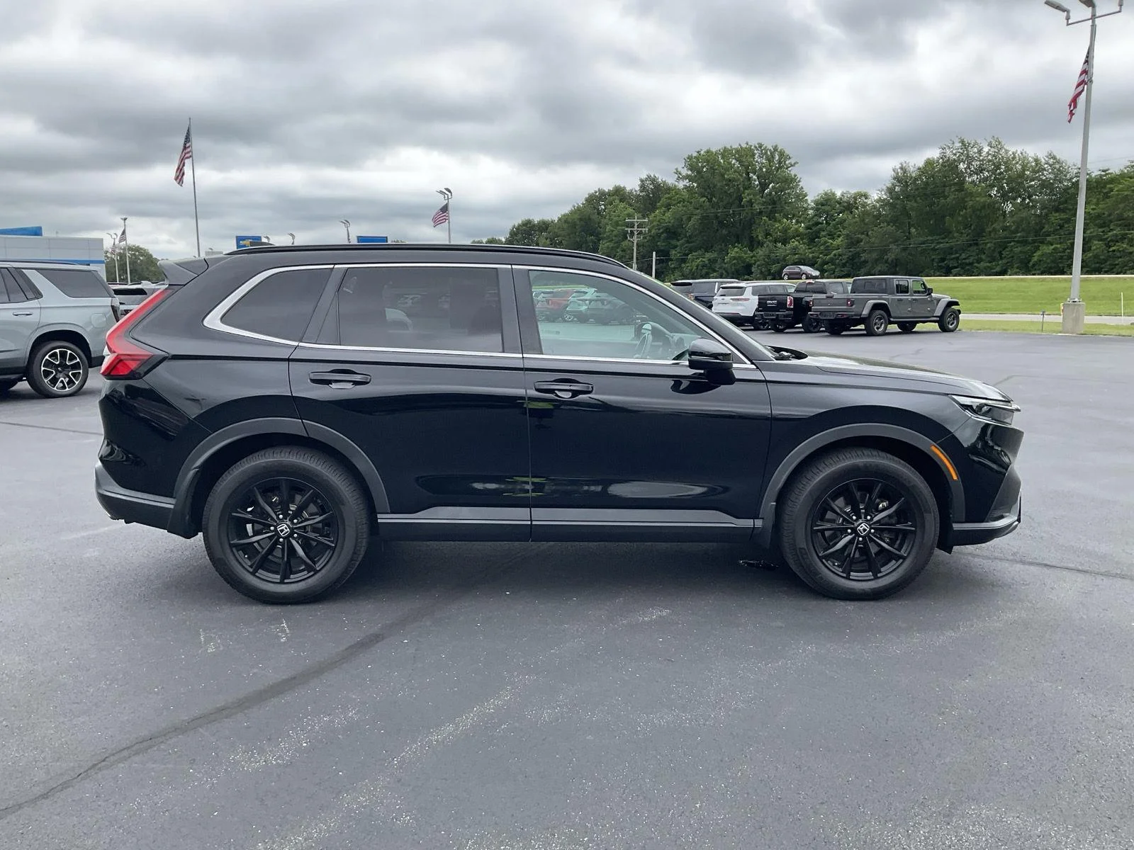Used 2023 Crystal Black Pearl Honda Sport image 4