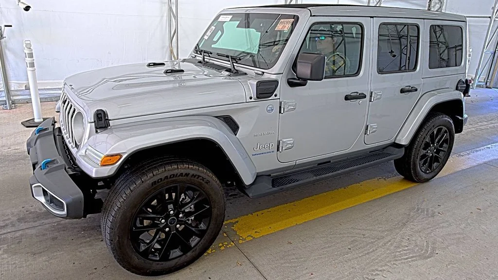 Used 2024 Silver Jeep Sahara 4xe image 1