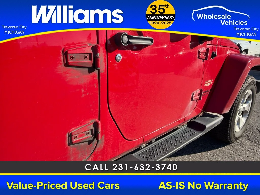 Used 2013 Flame Red Jeep Unlimited Sahara image 30