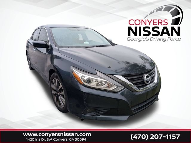Used 2016 Blue Nissan 2.5 SV image 1