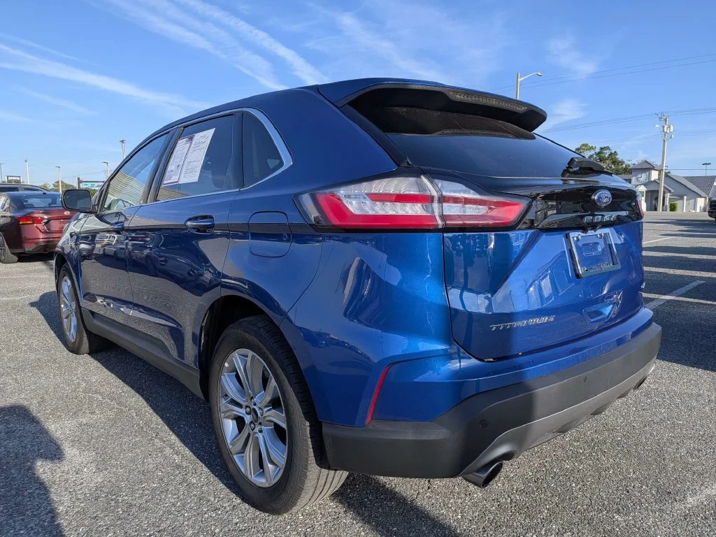 Certified Used 2024 Blue Metallic Ford Titanium image 5
