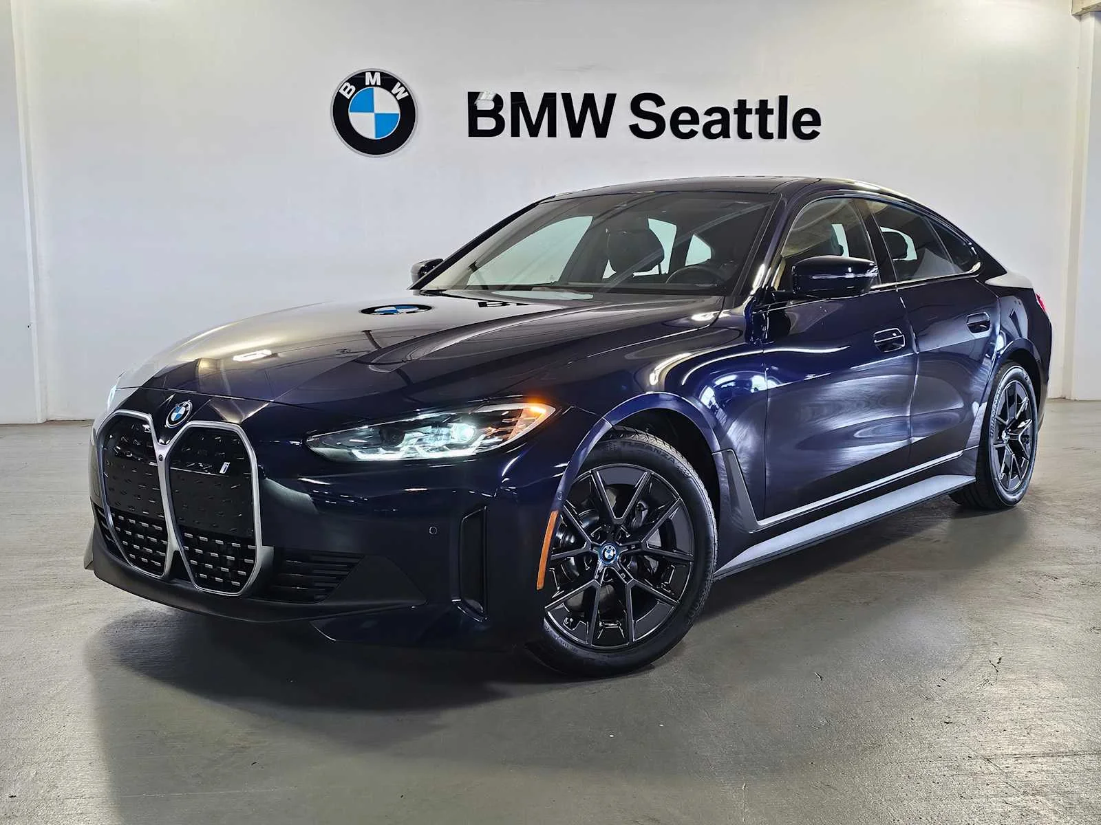 Certified Used 2023 Tanzanite Blue II Metallic BMW eDrive40 image 1