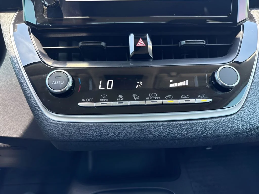 Used 2024 Black Toyota LE image 16