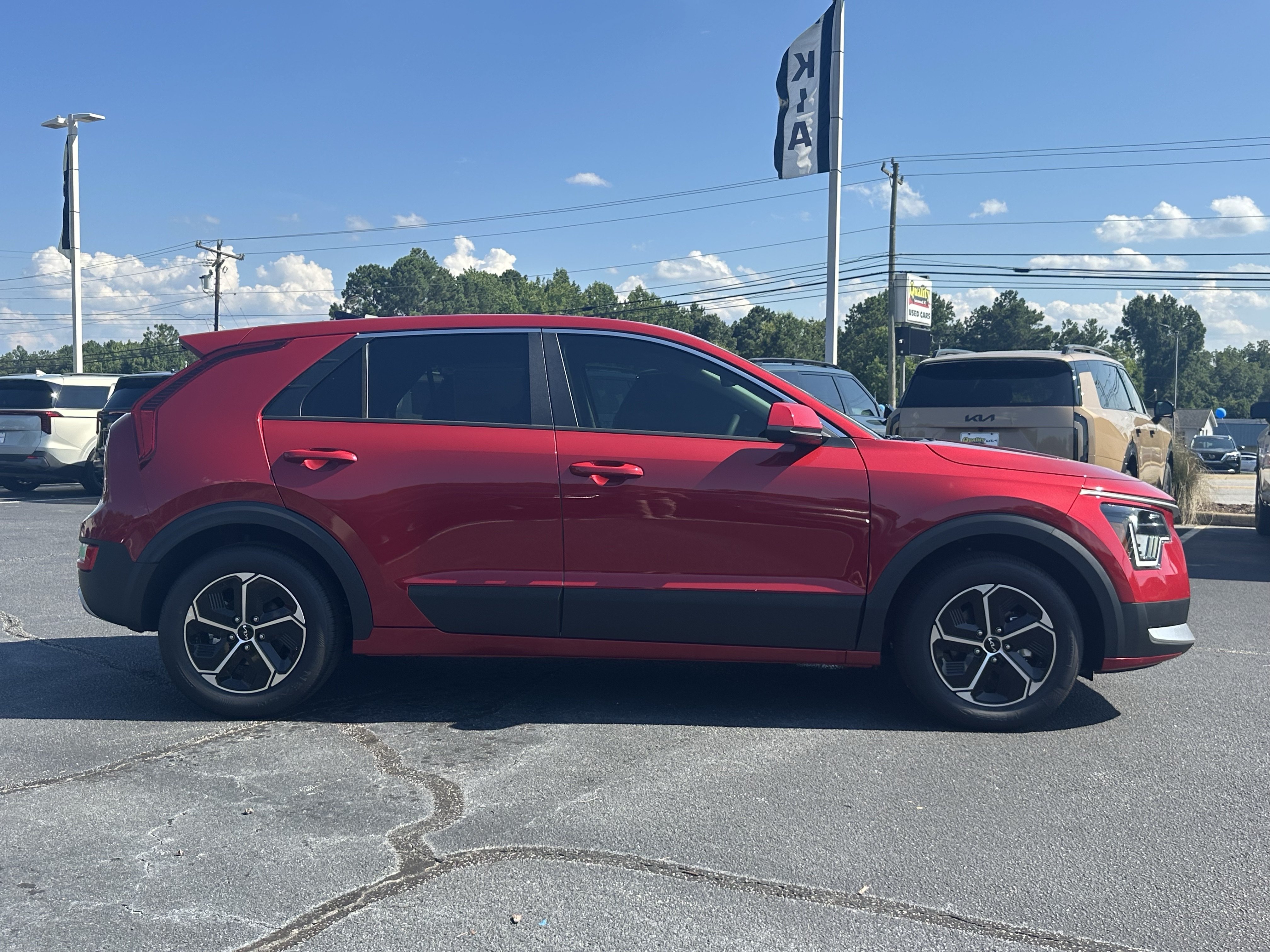 New 2026 Runway Red Kia LX image 9