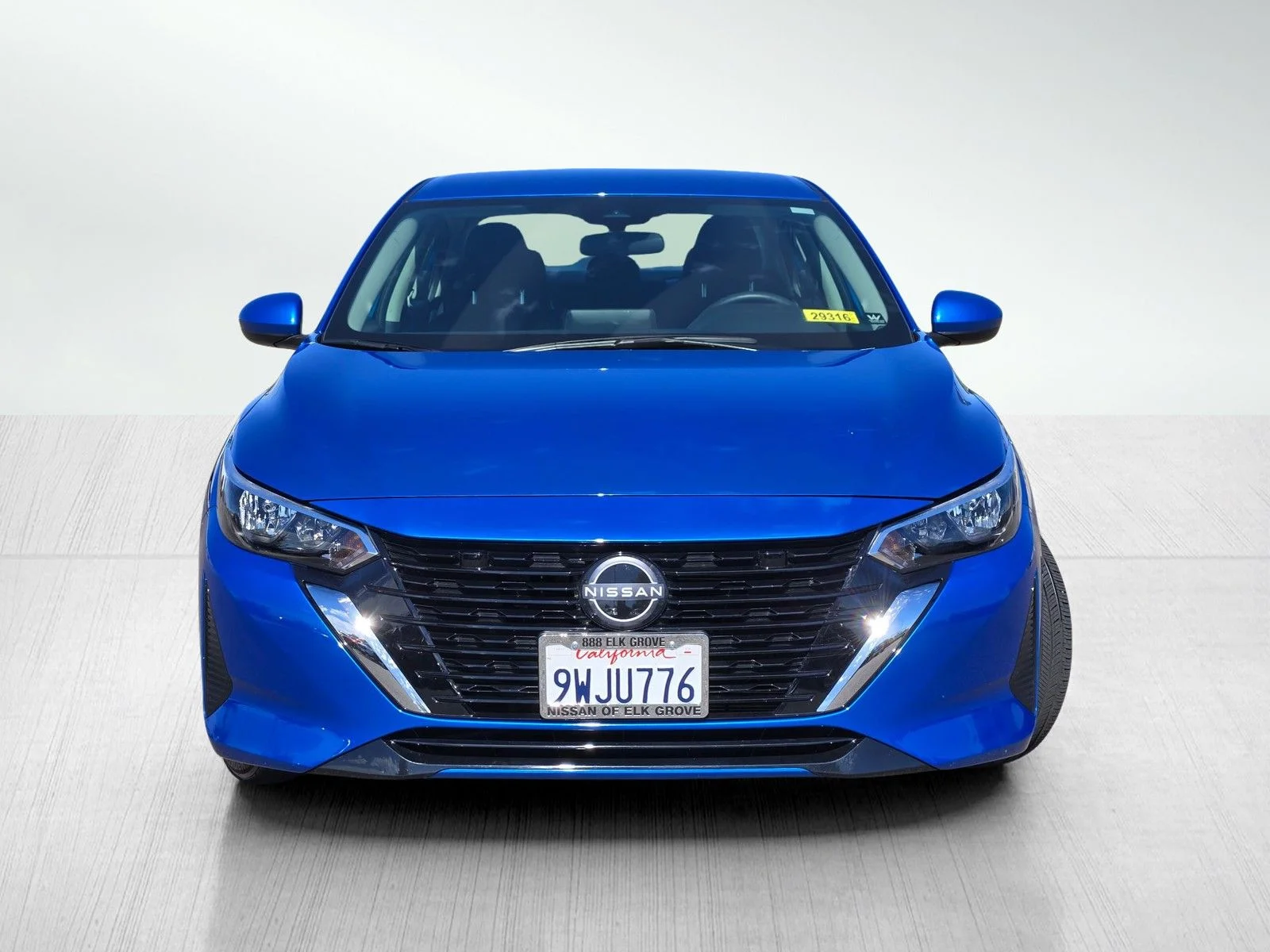 Used 2025 Electric Blue Metallic Nissan SV image 2