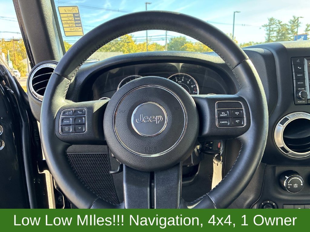 Used 2015 Black Jeep Sahara image 22