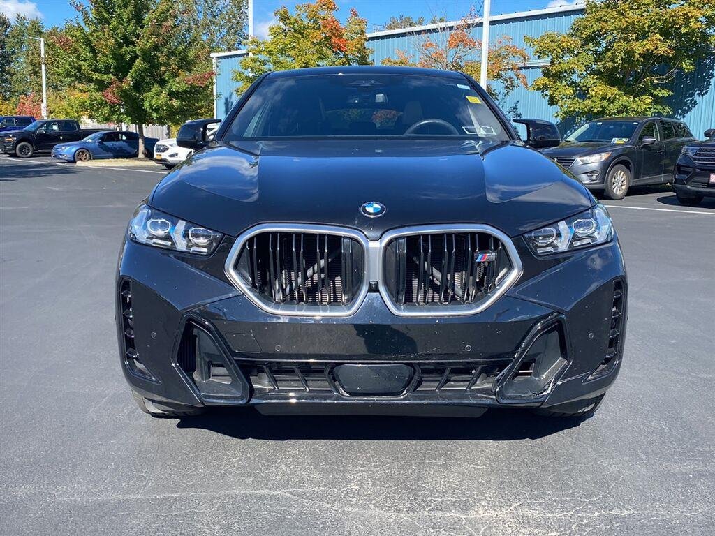 Used 2026 Black Sapphire Metallic BMW M60i image 6