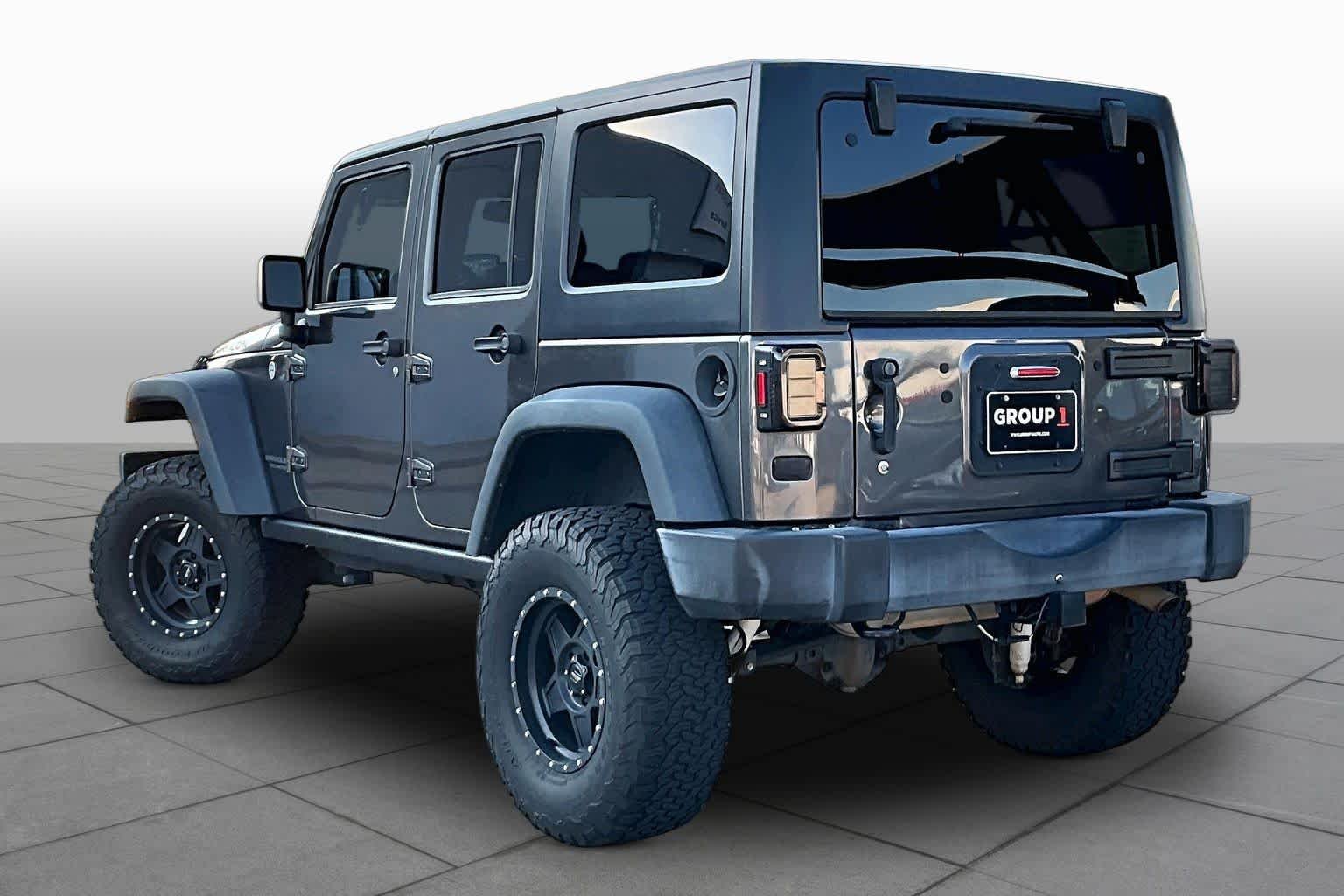 Used 2016 Granite Crystal Metallic Clearcoat Jeep Rubicon image 12