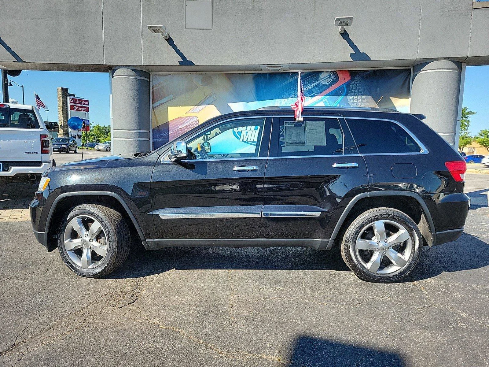 Used 2013 Brilliant Black Crystal Pearl Jeep Overland image 2