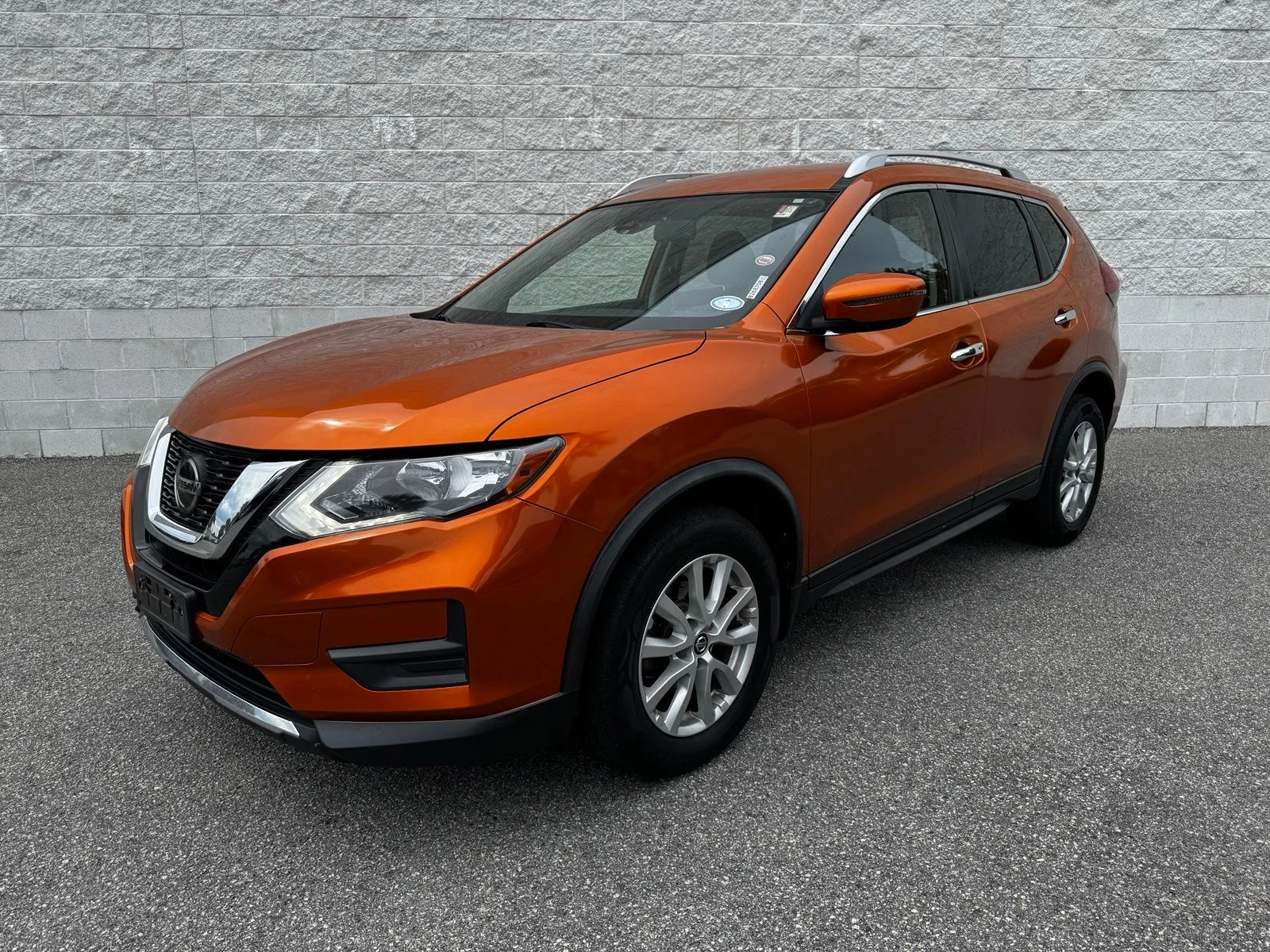 Used 2019 Orange Metallic Nissan SV image 1
