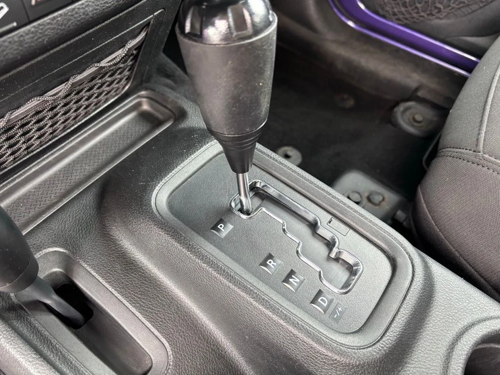 Used 2017 Purple Jeep Unlimited Sport image 14