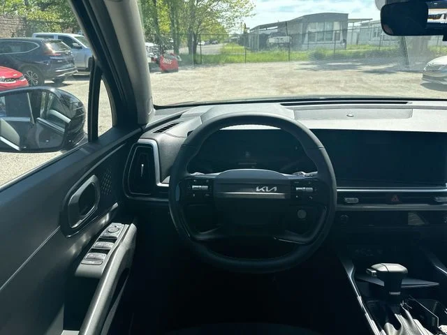 New 2026 Ebony Black Kia LX image 13