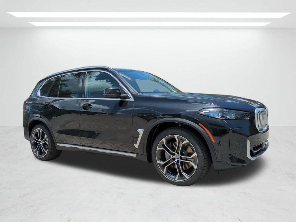 New 2026 Black Sapphire Metallic BMW xDrive50e image 2