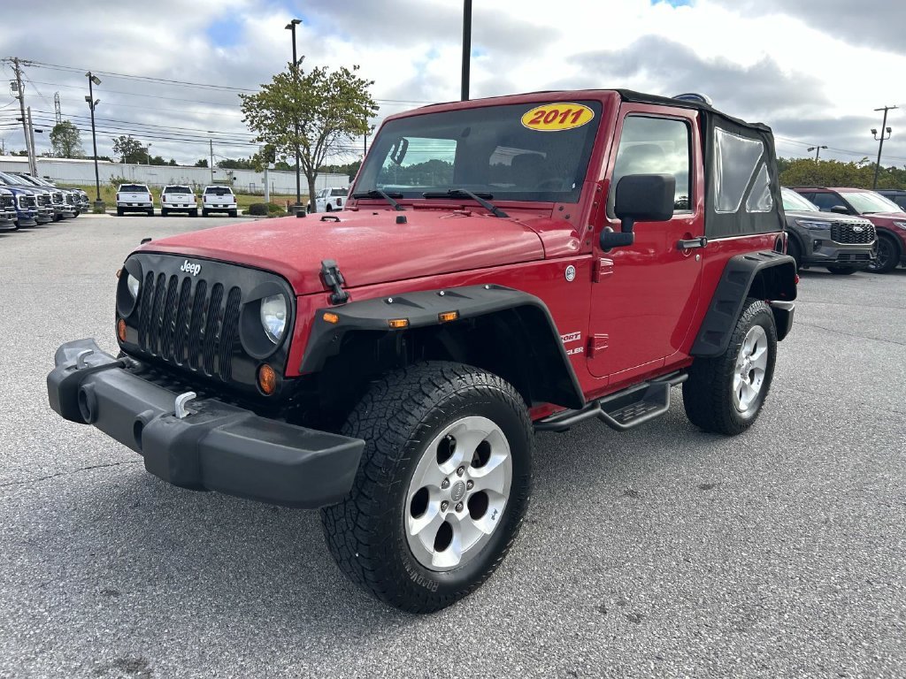 Used 2011 Flame Red Jeep Sport image 8