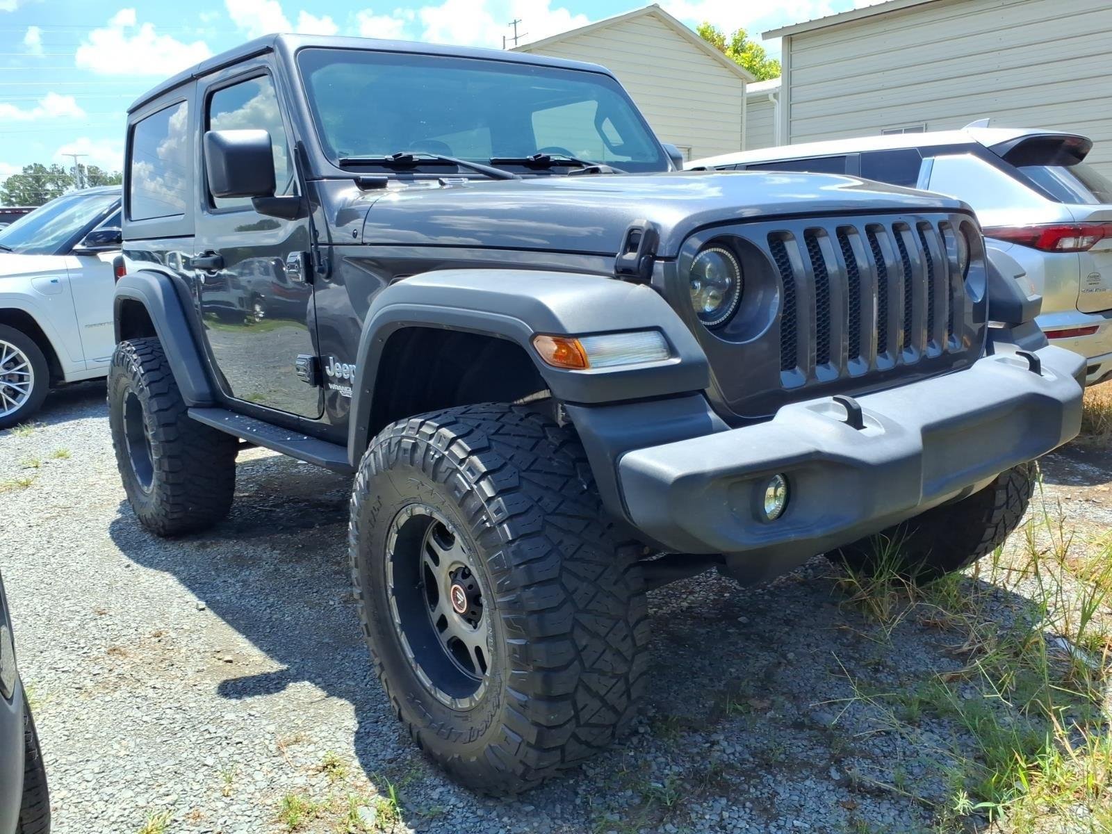 Used 2018 Granite Crystal Metallic Clearcoat Jeep Sport S image 5