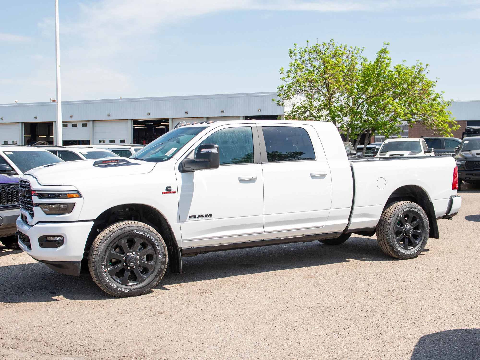 New 2026 White RAM Laramie* image 2