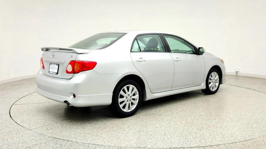 Used 2010 Classic Silver Metallic Toyota 4dr Sedan Manual S w/ Power Moonroof & 16