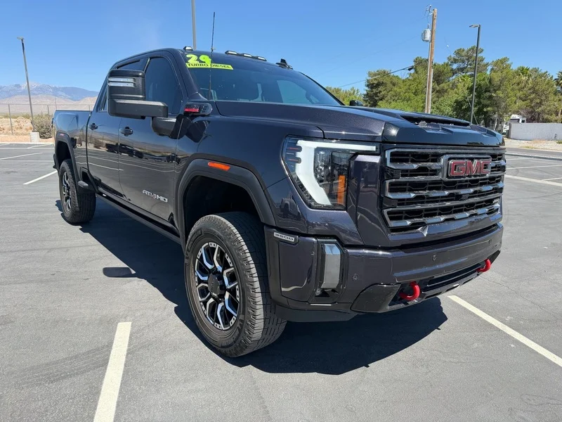 Used 2024 Titanium Rush Metallic GMC AT4 image 1