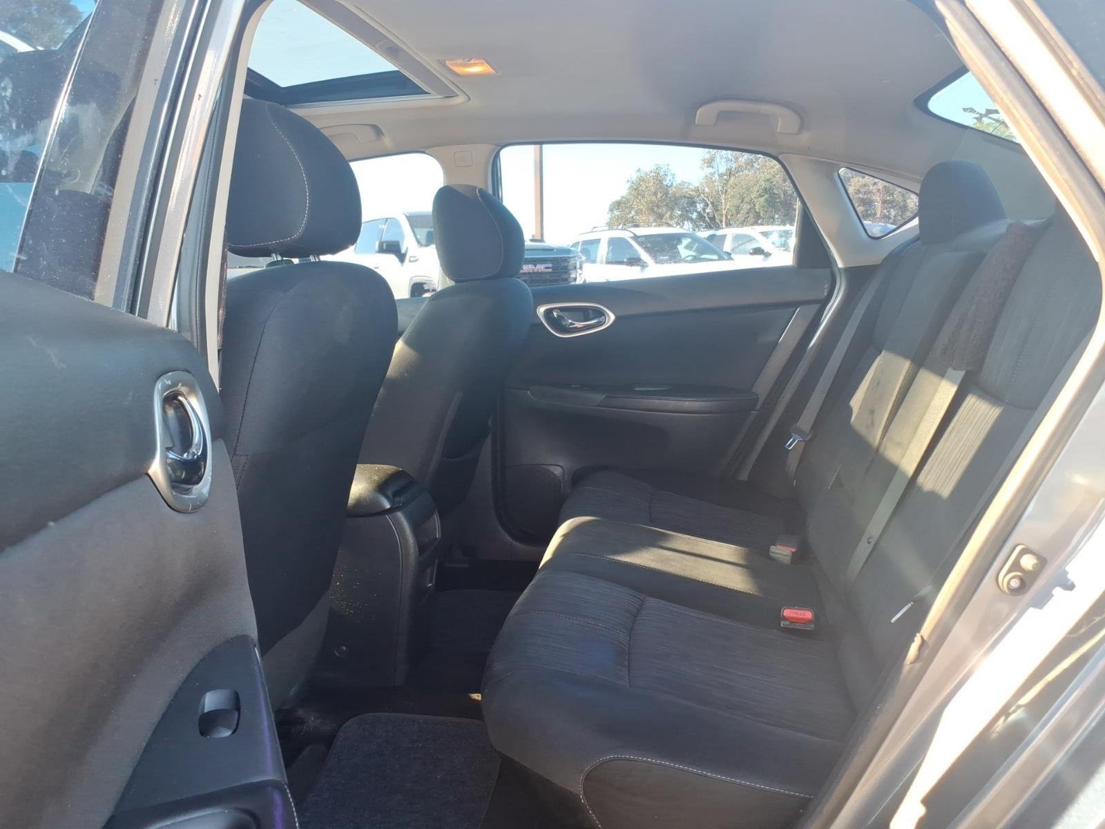 Used 2016 Gun Metallic Nissan SV image 10