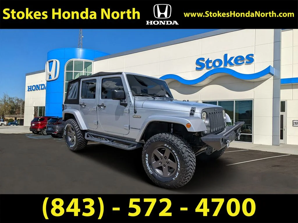 Used 2016 Silver Jeep Unlimited Sport S image 1