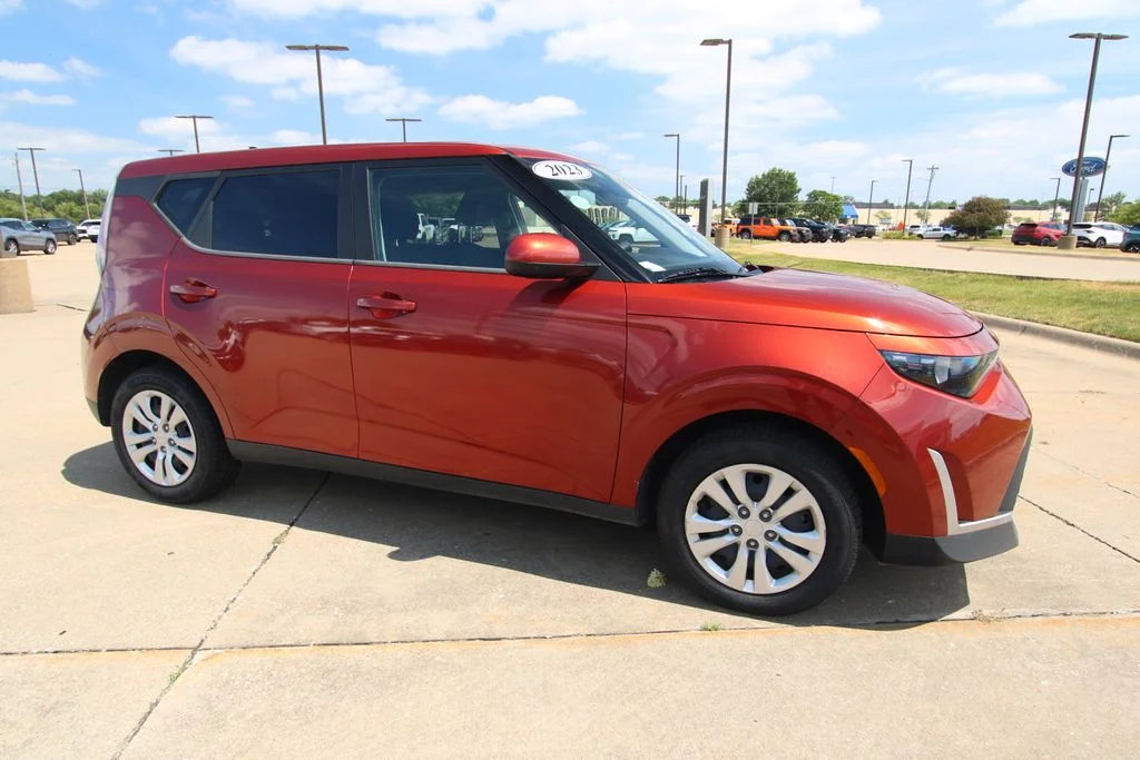 Used 2023 Orange Kia LX image 3
