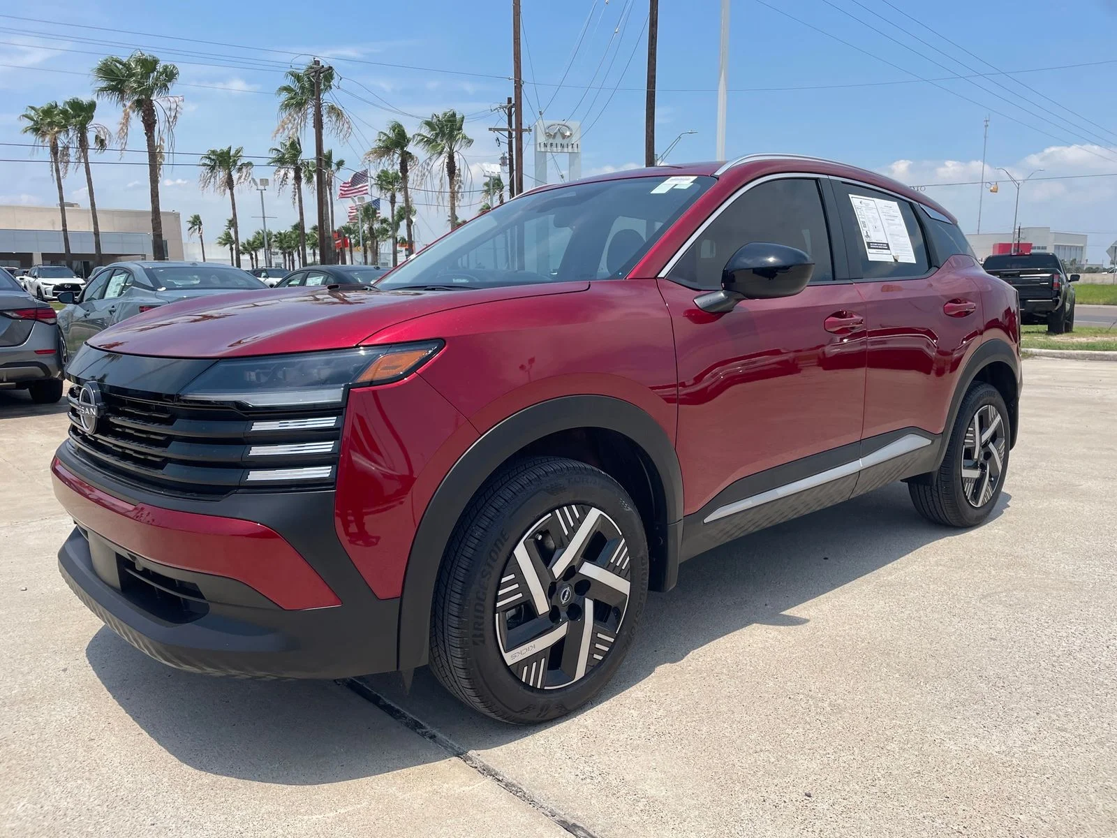 Used 2026 Red Nissan SV image 1