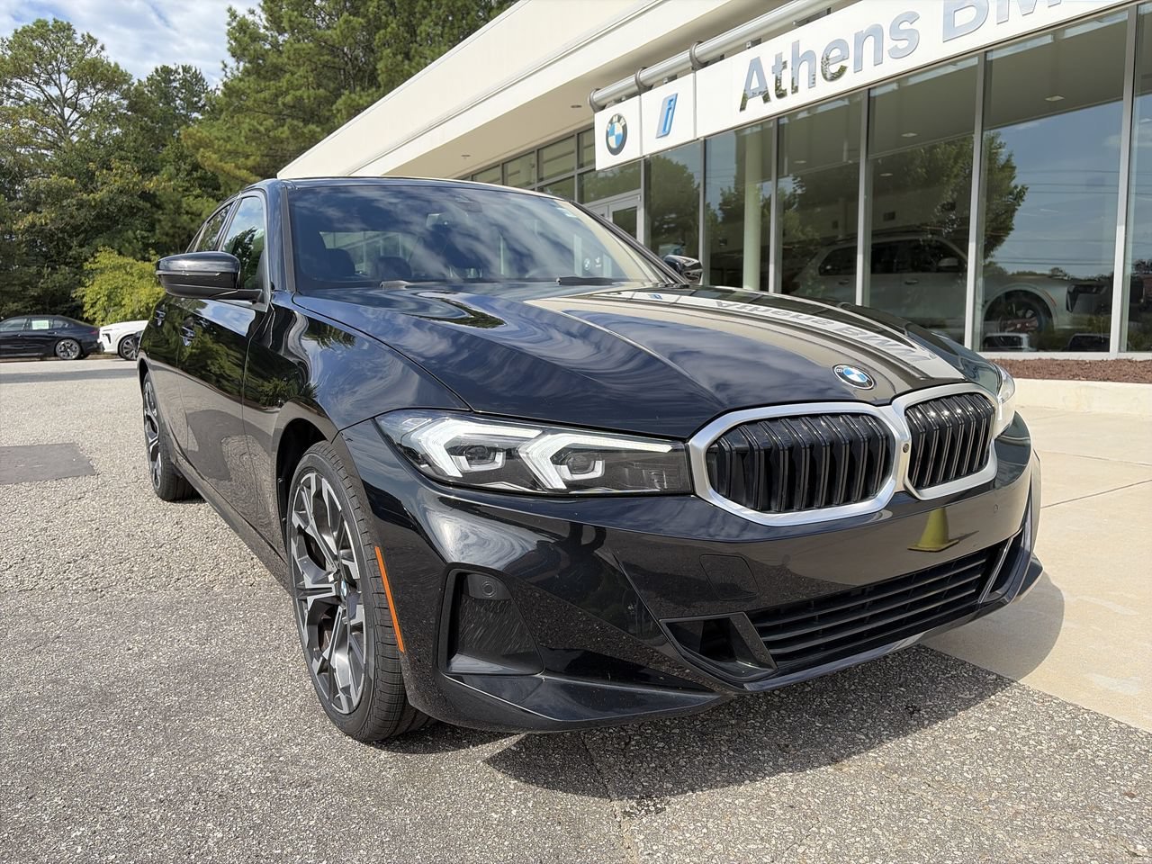 Used 2026 Black Sapphire Metallic BMW 330i NA image 1