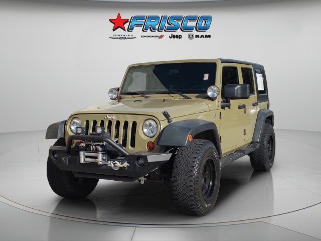 Used 2013 Green Jeep Unlimited Sport image 3