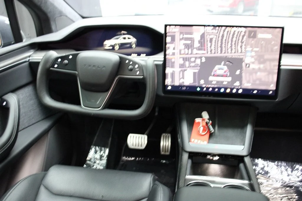 Used 2022 Solid Black Tesla Plaid image 41