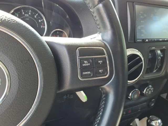 Used 2015 White Jeep Unlimited Sahara image 21
