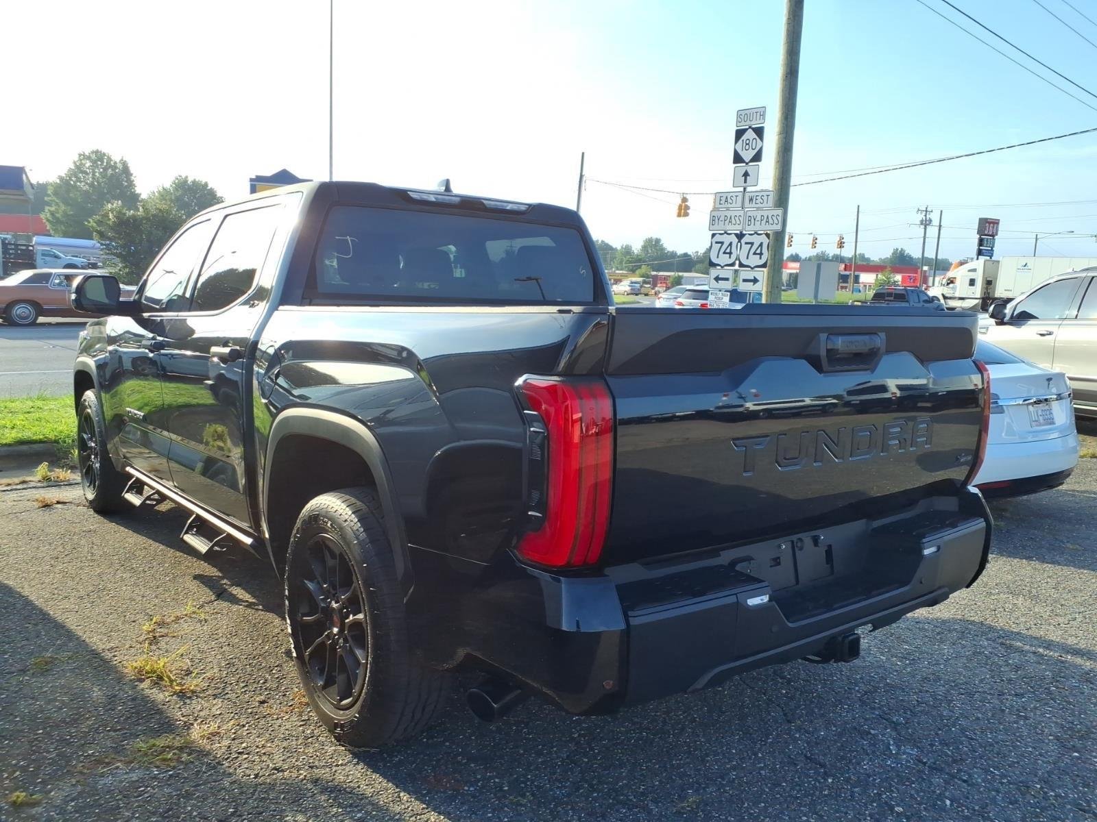 Used 2023 Midnight Black Metallic Toyota SR5 image 4