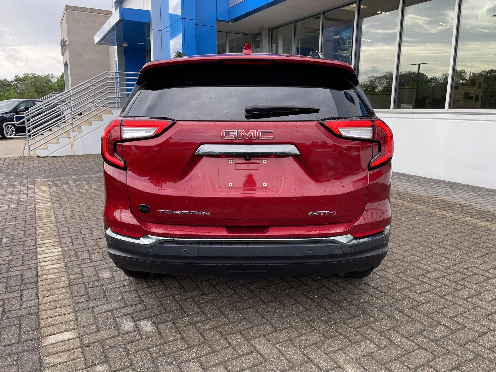 Used 2024 Volcanic Red Tintcoat GMC AT4 image 4