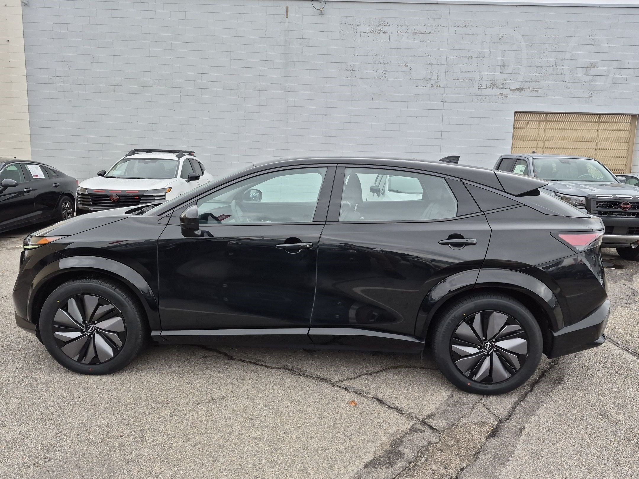 Certified Used 2024 Black Diamond Pearl Nissan EVOLVE+ image 8