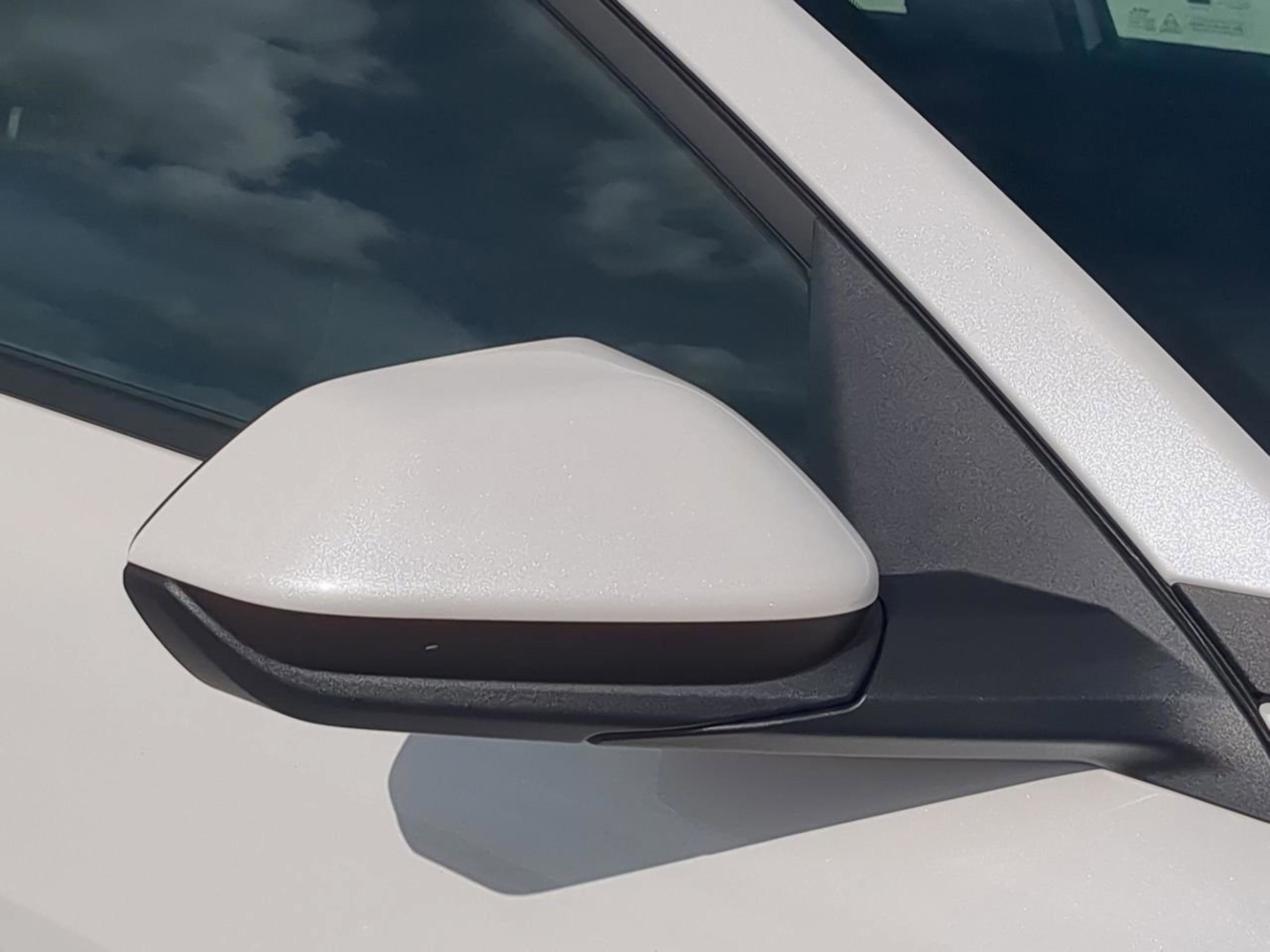 New 2026 Snow White Pearl Kia LX image 12