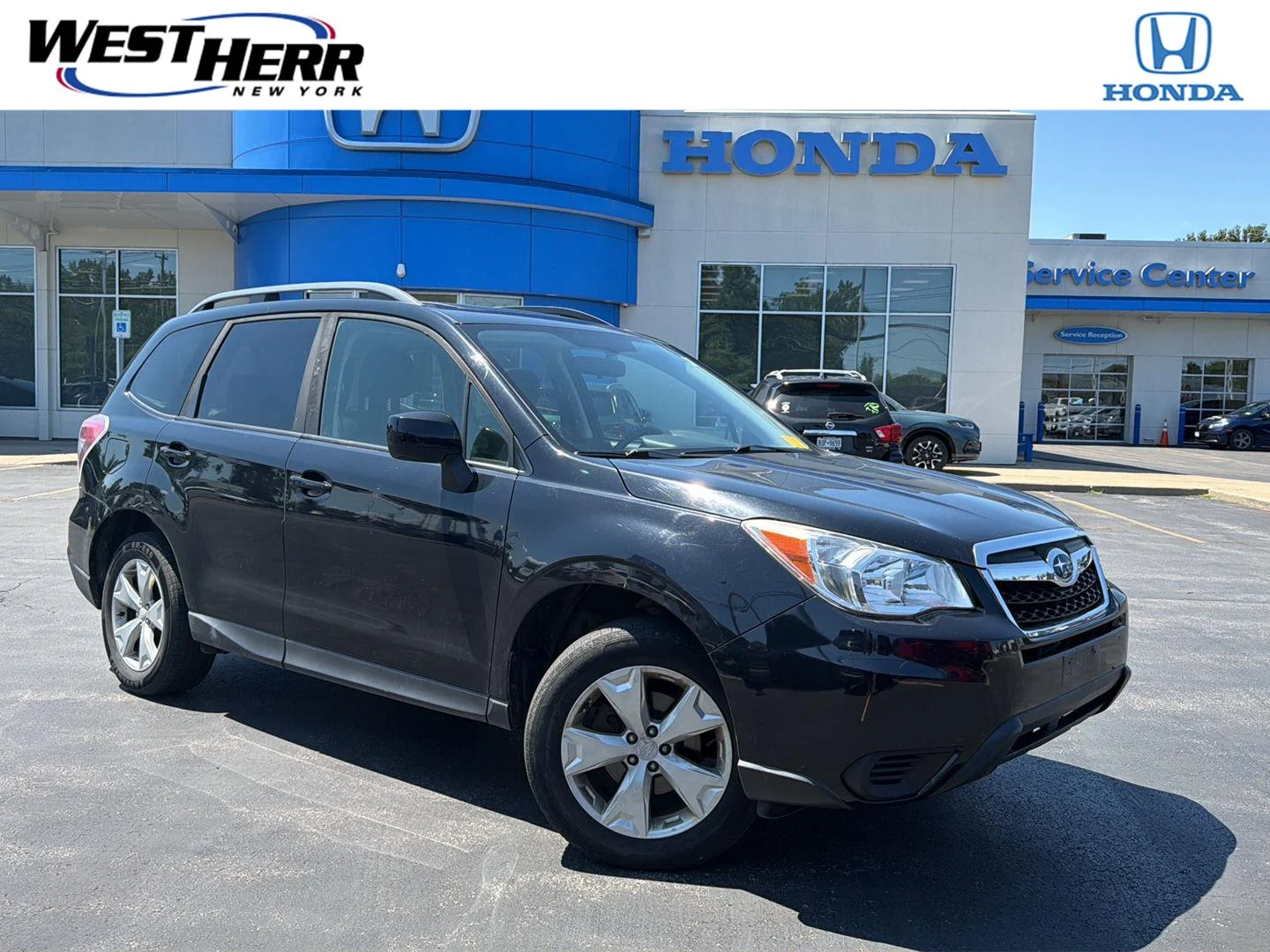 Used 2016 Crystal Black Silica Subaru 2.5i Premium image 1