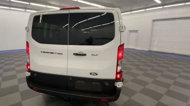 New 2026 Oxford White Ford Passenger Van XLT image 7